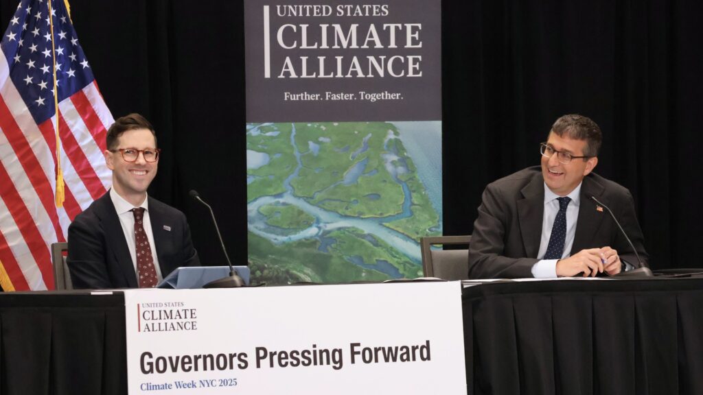 U.S. Climate Alliance Executive Director Casey Katims and Delaware Governor Matt Meyer.